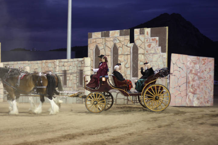 a3a1a0.jpg - Honored Clan President Bill J & Norma Wallace grand entrance to the Tattoo