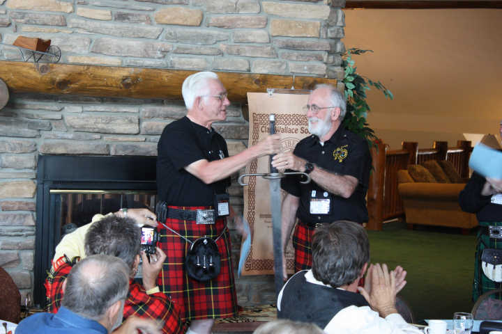 a4a2a1a1.jpg - Incoming President Bob Wallace-NV accepts the Wallace Sword from Outgoing President Bill J Wallace-OR